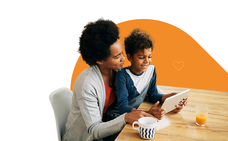 woman interacting with youth on tablet